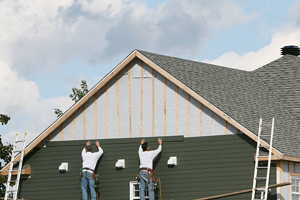 Professional Vinyl Siding technician working in Reinholds, PA